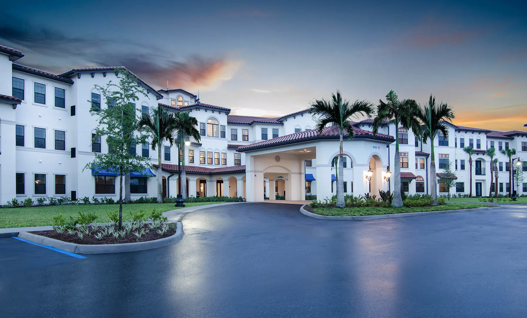 Exterior shot / entrance of American House senior living community in Estero, FL